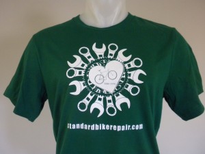 The forrest green version of our t-shirts printed by Derrick Block and Apollo Ink with Canvas t's.