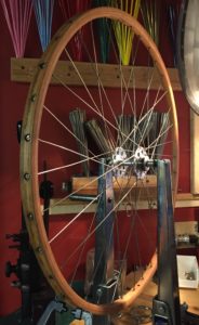 Bike Shop Hours Analogous to the "Balancing of a Wooden Rim"