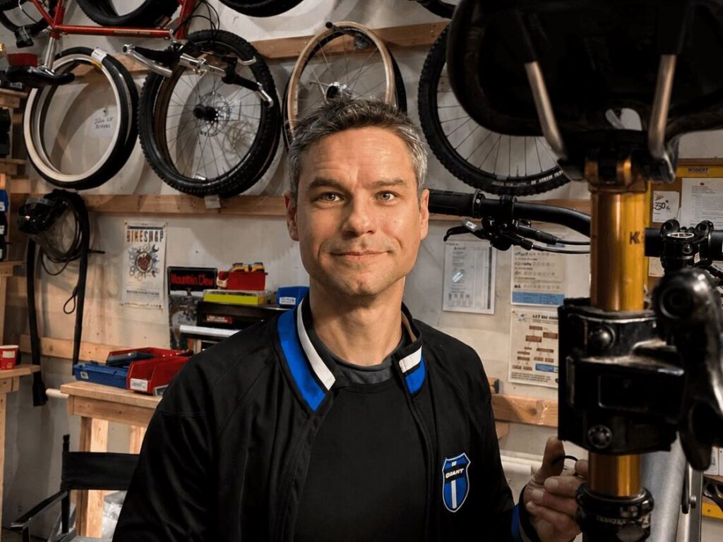 Alex Rewun of Super Clean Suspension in his bike workshop